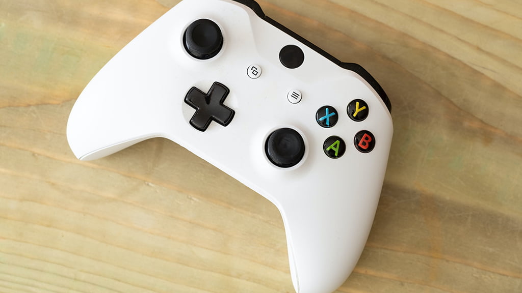Comment solutionner ce problème de boutons coincés sur une manette de jeu Xbox One ?